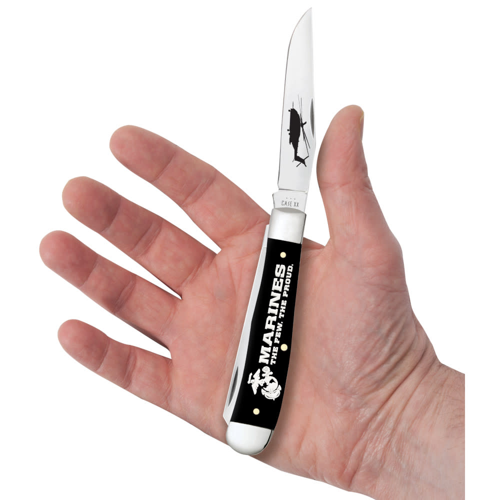 USMC® Embellished Smooth Black Synthetic Trapper Knife in Hand