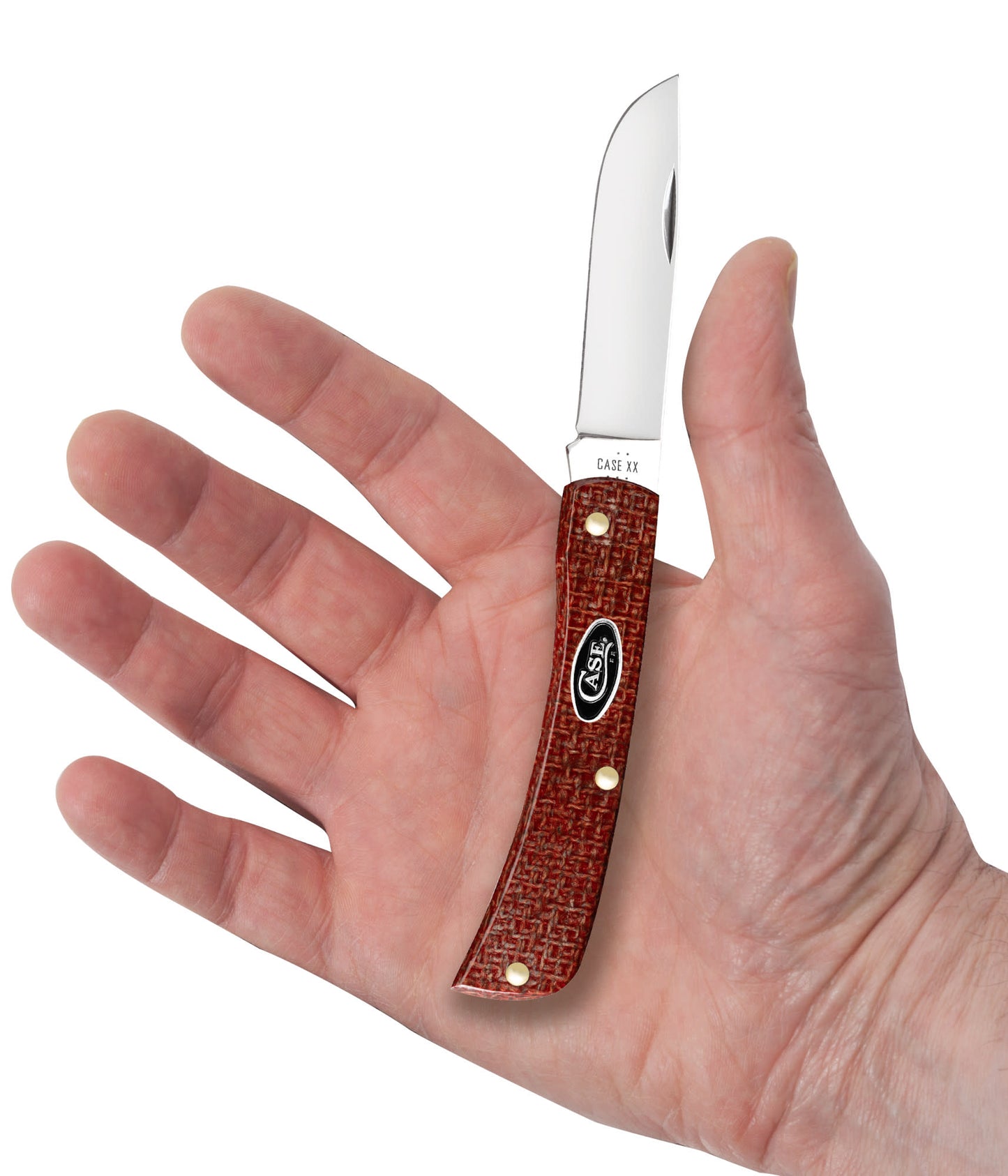 Smooth Dark Red Burlap Micarta® Sod Buster® Jr in hand.