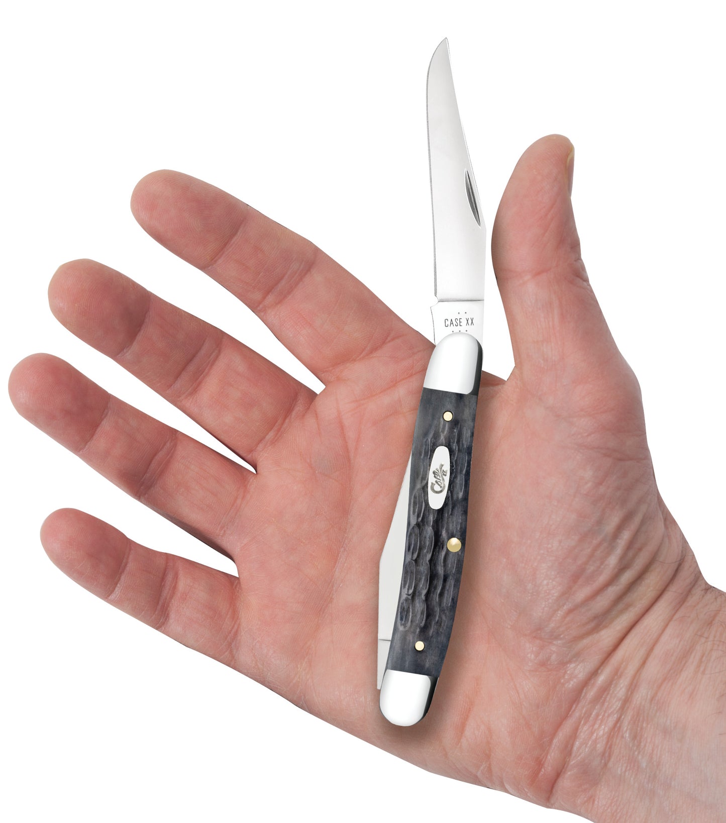 Crandall Jig Pocket Worn® Gray Bone CS Muskrat in hand.