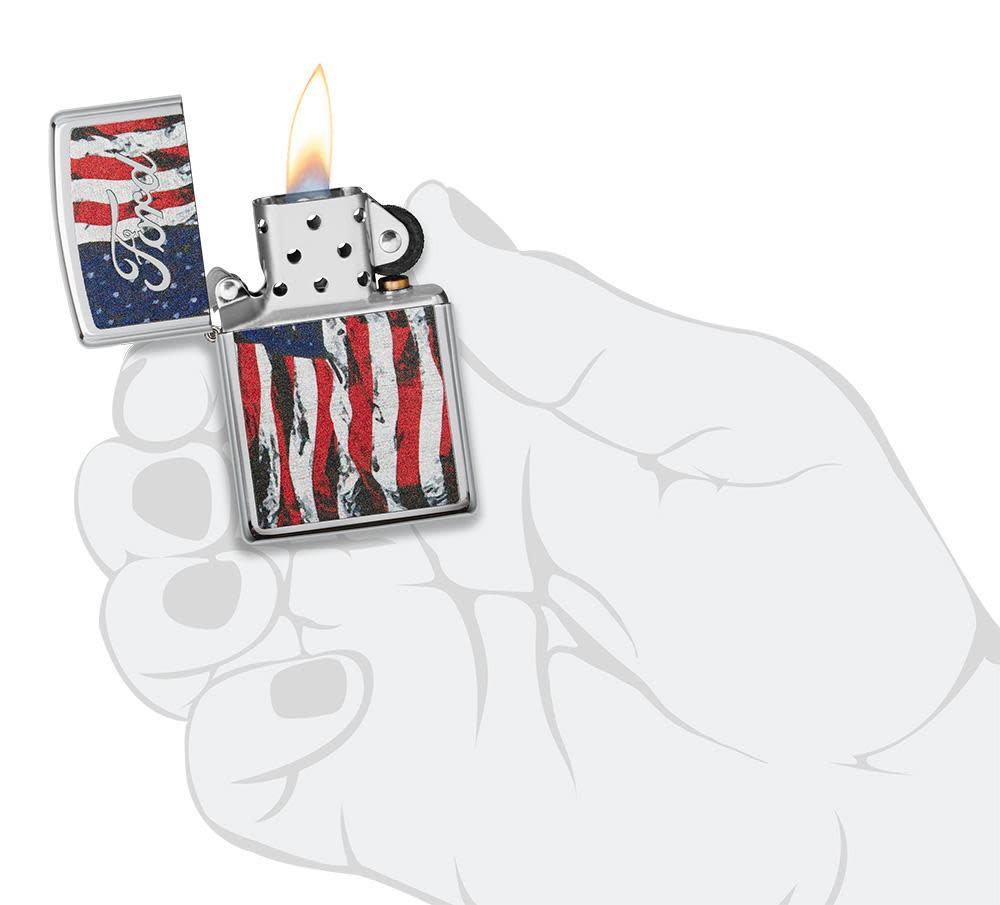 Front view of the Ford lighter in hand open and unlit