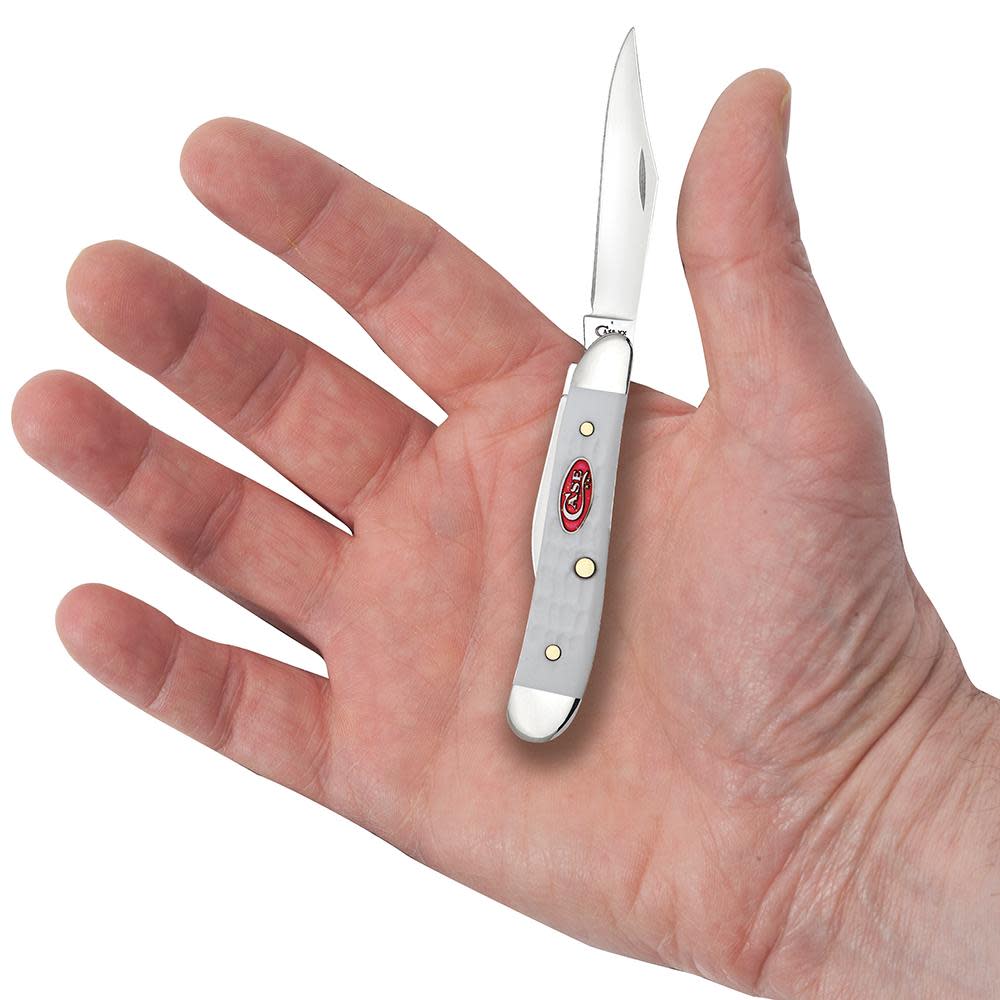 SparXX™ Standard Jig White Synthetic Peanut Knife in Hand