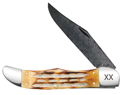 Deep Canyon Jigged Burnt Natural Bone Raindrop Damascus Folding Hunter Front View