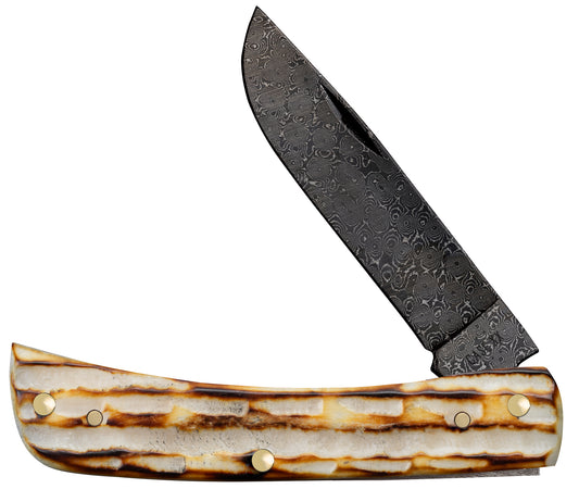 Deep Canyon Jigged Burnt Natural Bone Raindrop Damascus Sod Buster Jr Front View