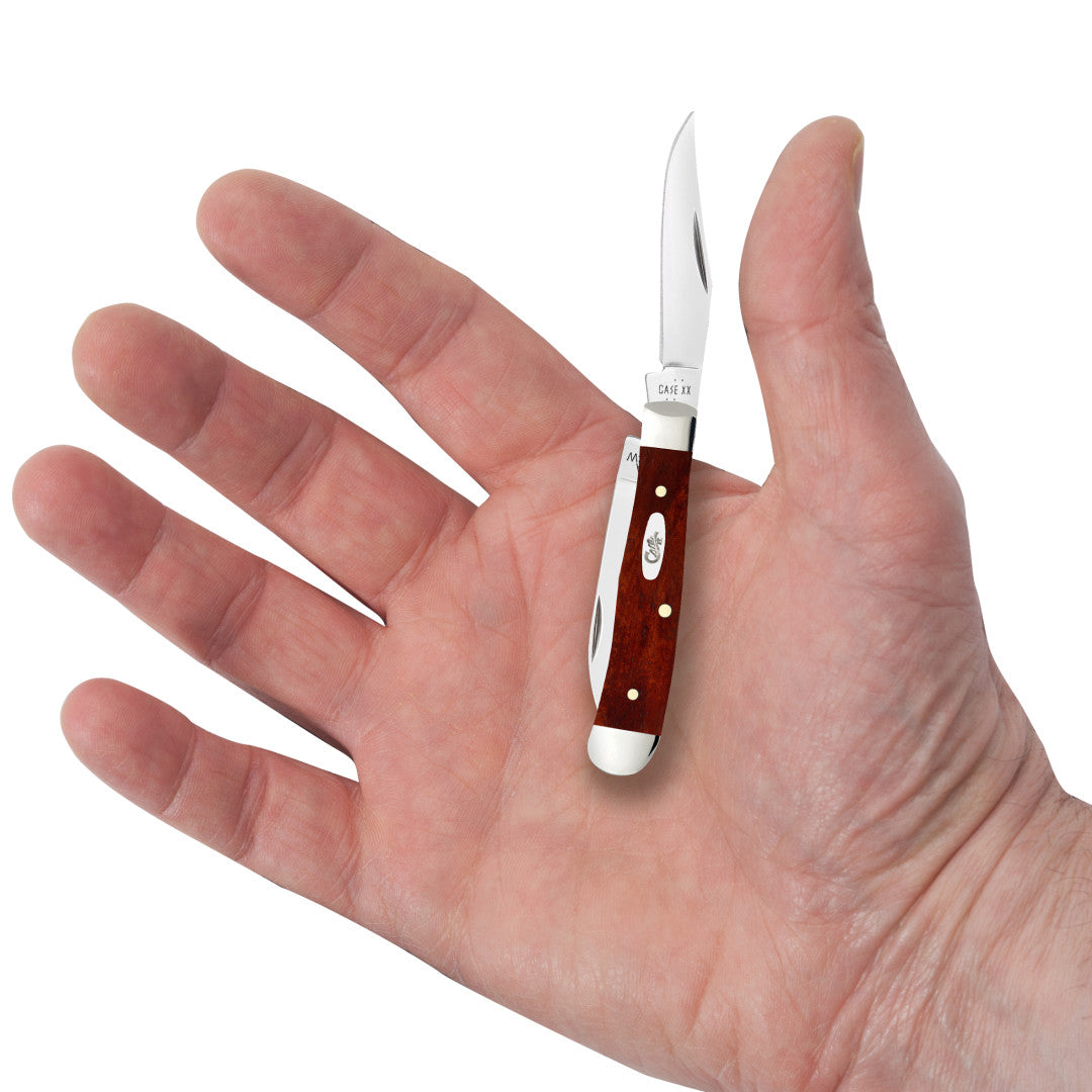 Smooth Chestnut Bone Tiny Trapper in Hand