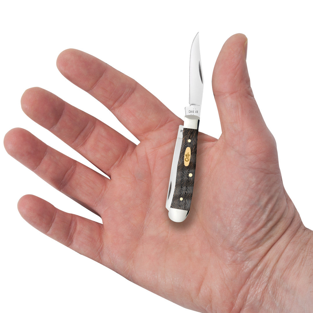 Smooth Black Curly Oak Wood Tiny Trapper in Hand