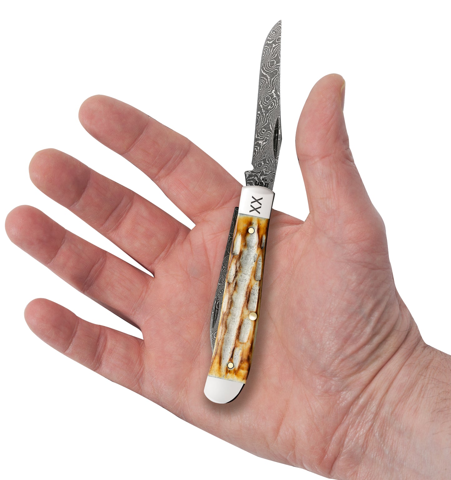 Deep Canyon Jigged Burnt Natural Bone Raindrop Damascus Mini Trapper In Hand