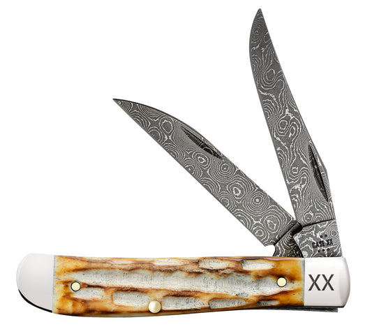 Deep Canyon Jigged Burnt Natural Bone Raindrop Damascus Mini Trapper Front View