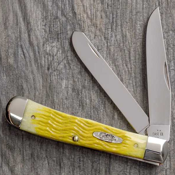 Platts Jig Yellow Bone Trapper on a wooden surface.