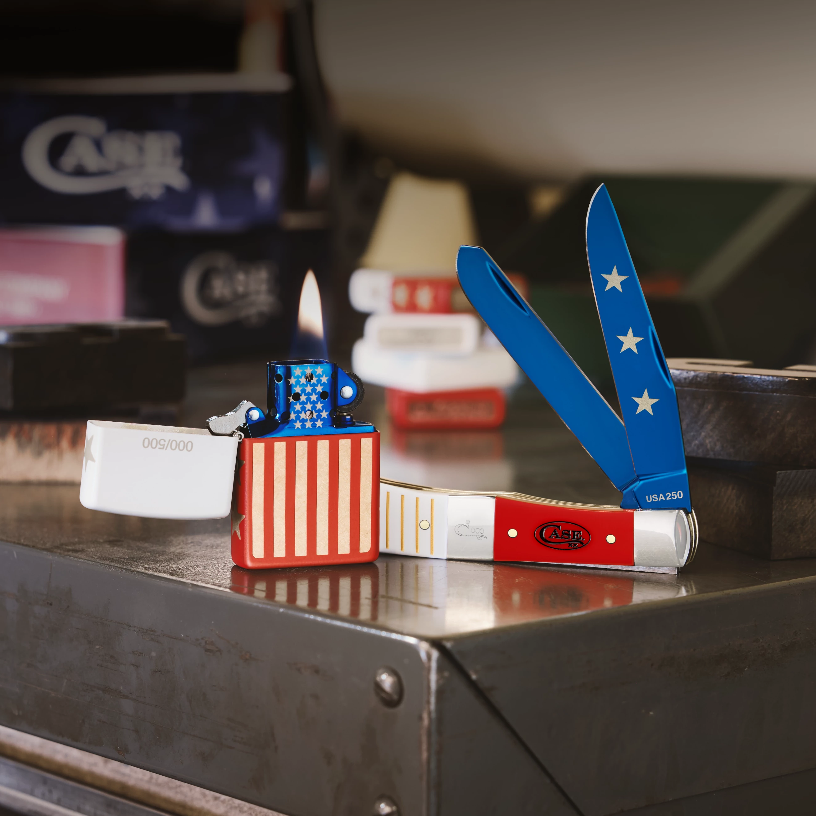 Case knife and Zippo lighter on a metal surface with a blurred background.