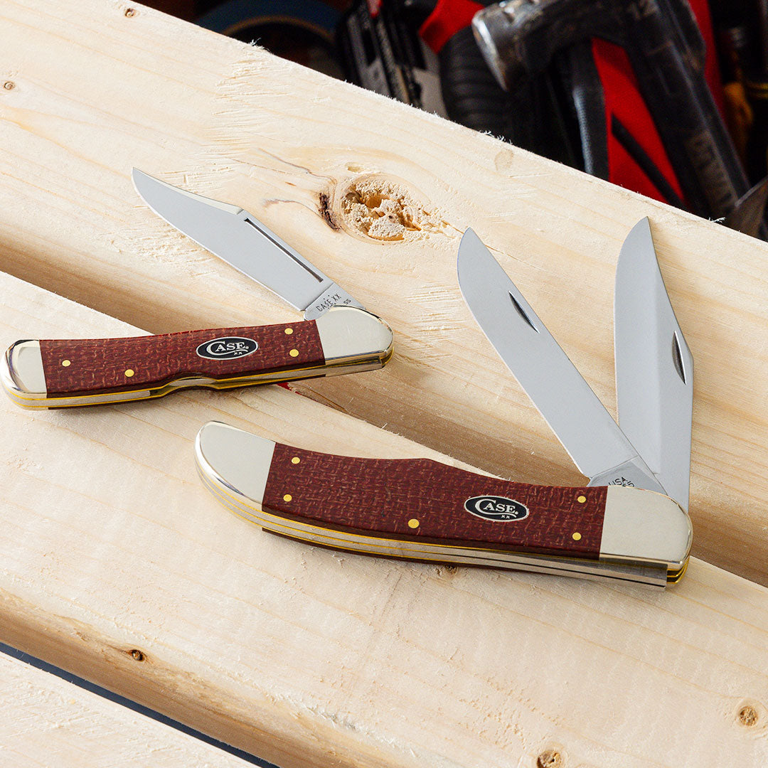 Dark Red Burlap Micarta CS knives.
