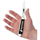 USMC® Embellished Smooth Black Synthetic Trapper  Knife in Hand