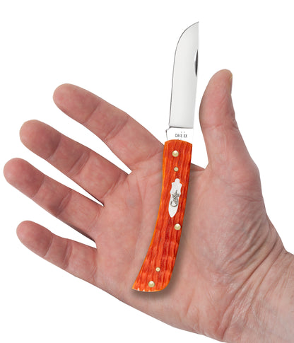 Crandall Jigged Tequila Sunrise Bone Sod Buster® Jr in Hand