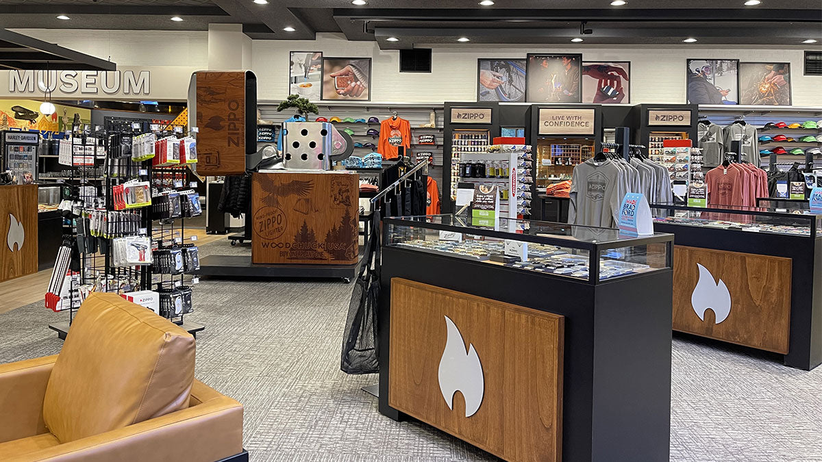 Interior of the Zippo/Case Museum store, with various products for sale and a display of a large Zippo lighter.