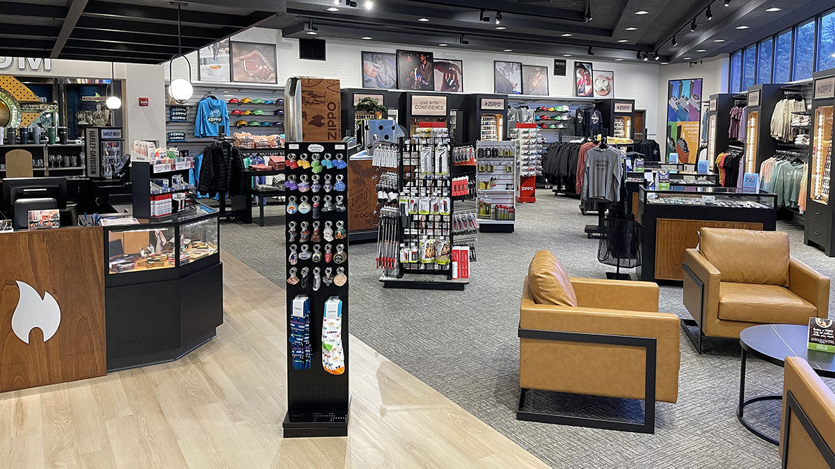 Interior of the Zippo/Case Museum store, with various products for sale and a display of a large Zippo lighter.