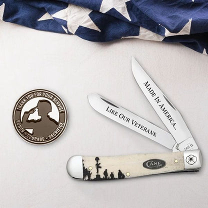 Lifestyle image of Veterans Day Commemorative Smooth Natural Bone Trapper 2025 Gift Set shown near an American flag.