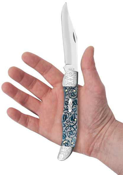 Embellished Smooth Mediterranean Blue Bone Ivy Folding Hunter in hand.