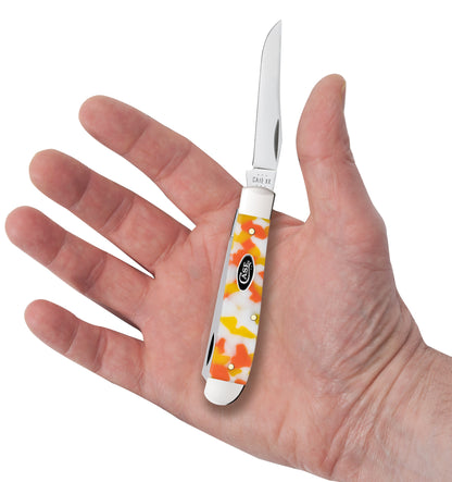 Smooth Candy Corn Kirinite® Mini Trapper in hand.