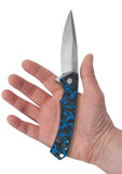 Blue, Black and White Marbled Carbon Fiber Marilla® in hand
