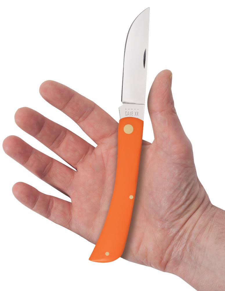 Orange Synthetic Sod Buster® Knife in Hand