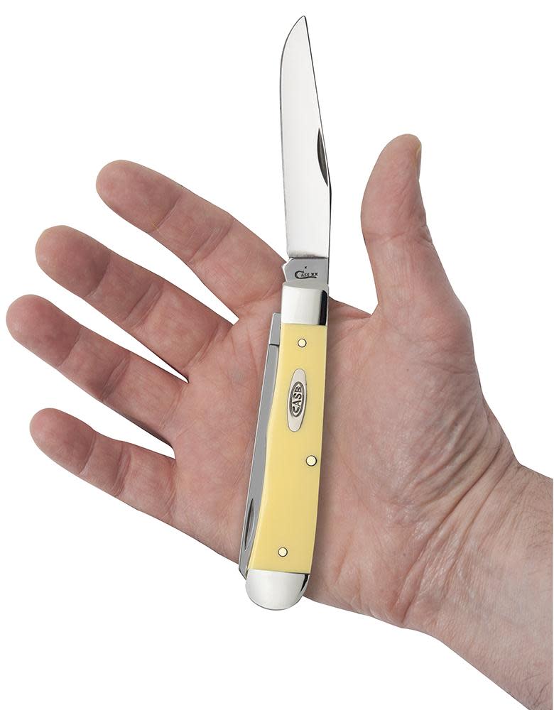 Yellow Synthetic Trapper Knife in Hand