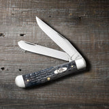Pocket Worn® Crandall Jig Gray Bone Trapper Knife on Wooden Background
