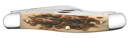 Peach Seed Jig Amber Bone Stockman Knife Closed