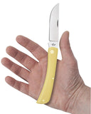 Yellow Synthetic Sod Buster® Knife in Hand