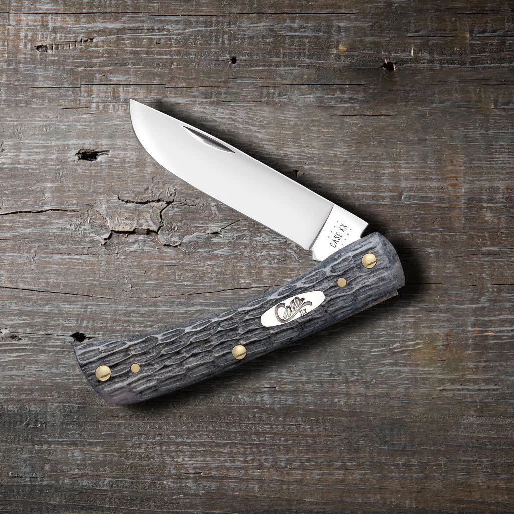 Pocket Worn® Crandall Jig Gray Bone Sod Buster® Jr Knife on Wood Background