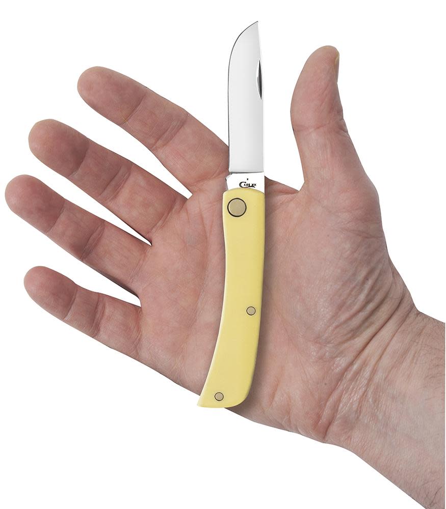 Yellow Synthetic Sod Buster® Jr Knife in Hand