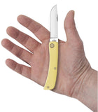 Yellow Synthetic Sod Buster Jr® Knife in Hand