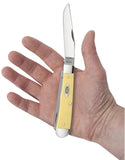 Smooth Yellow Synthetic CS Trapper Knife Open in Hand