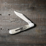 Harley-Davidson® Embellished Smooth Natural Bone Mini CopperLock® Knife on Wood Background