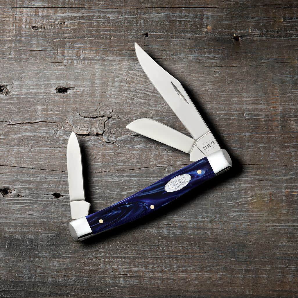 Smooth Blue Pearl Kirinite® Medium Stockman Knife on Wooden Background