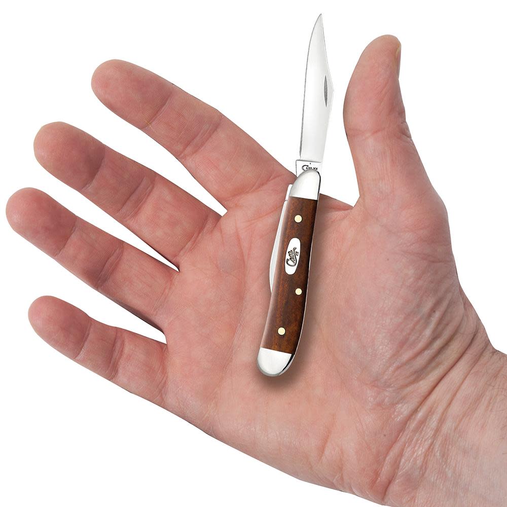 Smooth Chestnut Bone Peanut Knife in Hand
