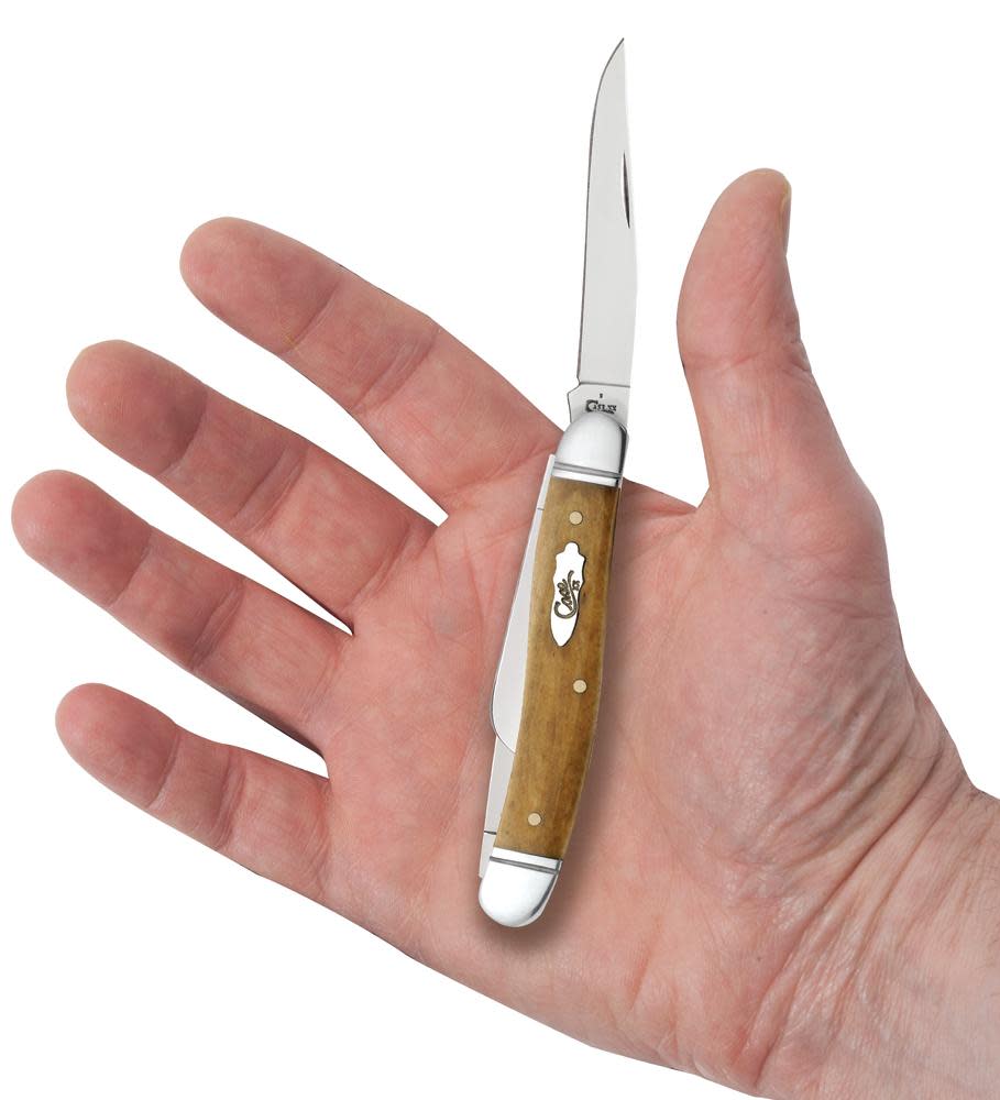Smooth Antique Bone Medium Stockman Knife in Hand