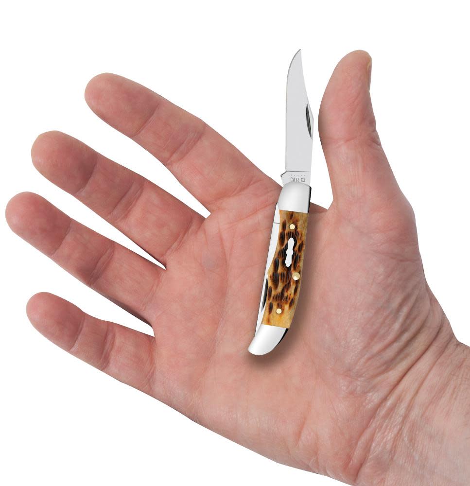 Pocket Worn® Peach Seed Jig Antique Bone Pocket Hunter Knife in Hand