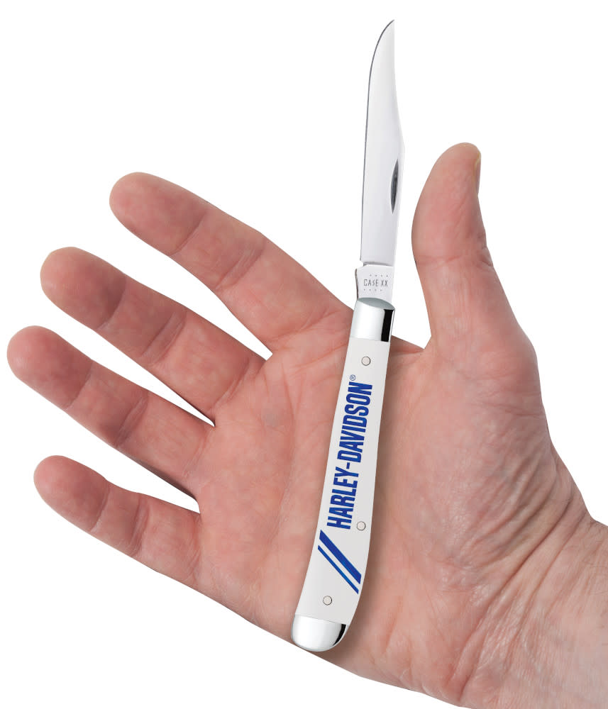 Harley-Davidson® Embellished Smooth White Synthetic Slimline Trapper Knife in Hand