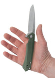 OD Green Anodized Aluminum Kinzua® with Spear Blade Knife in Hand