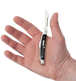 Jigged Rough Black® Synthetic Small Congress Knife in Hand