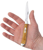 Smooth Antique Bone Slimline Trapper Knife in Hand