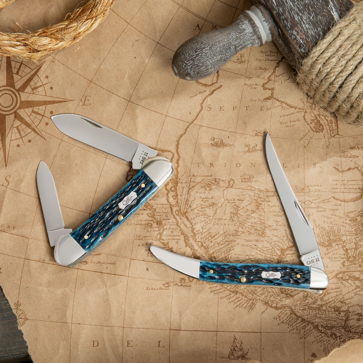 Pocket Worn® Peach Seed Jig Mediterranean Blue Bone Canoe Knife on Map Background