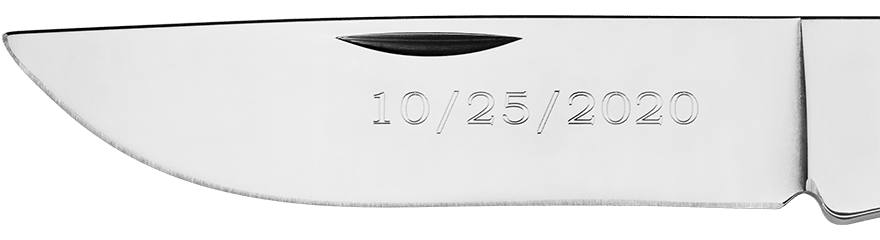 Example of custom engraving on a blade in Serif font
