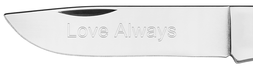Example of custom engraving on a blade in Sans-Serif font